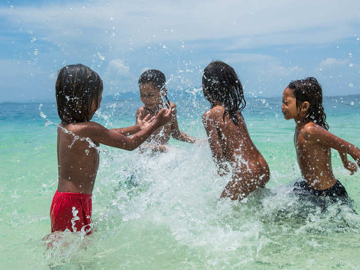 The Bajau spend the majority of their time in the water. For the children, that means lots of splashing and playing.