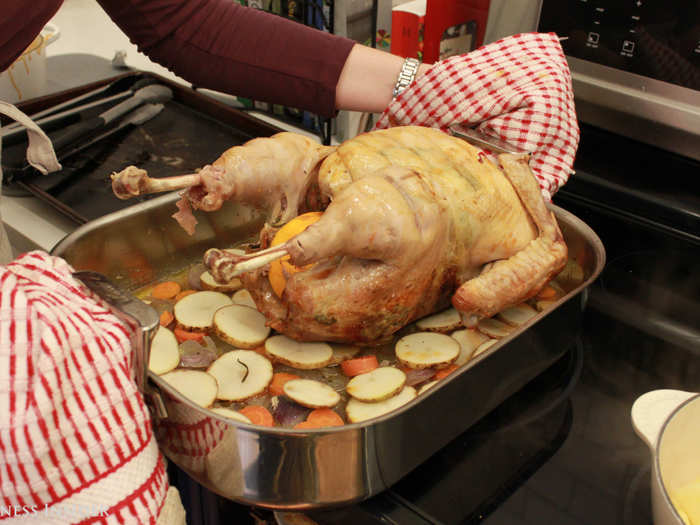 Slice potatoes into 1/4 inch rounds and lay down one to two layers in the bottom of a roasting pan. Not only will they keep your bird from stewing in its own juices, they