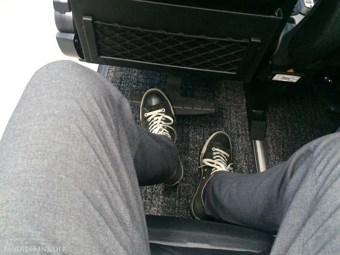 Plenty of leg room here, and even a little foot rest. I can actually stretch out my legs!