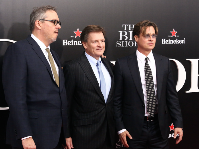 Director Adam McKay with Michael Lewis and Brad Pitt