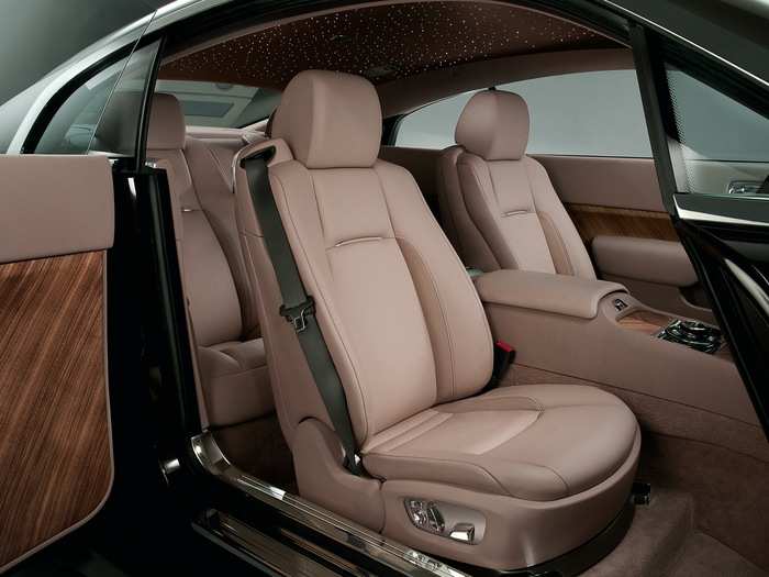 As expected with any vehicle carrying the Rolls-Royce name, the interior of the Wraith is covered in plush leather and rich wood paneling.