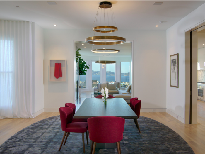 The newly open floor plan allows one to sit at the dining room table and still look out over the San Francisco Bay.
