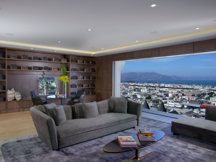 The huge glass windows that look down on the city below are another new addition, and you can slide them open to walk out on to the balcony.