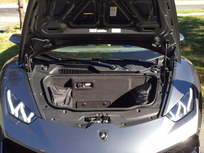 There is some storage space under the hood (the engine, remember, is located behind the driver).