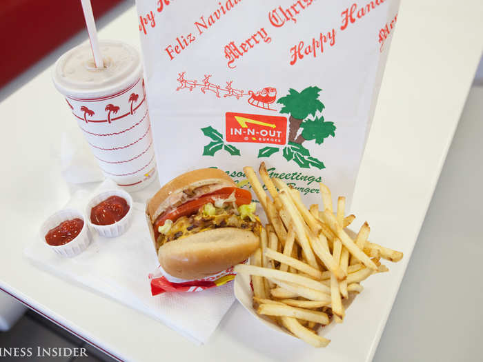 My number was called, and I picked up my In-N-Out order: a classic double-double with grilled onions, fries, and a chocolate milkshake. Unlike at Whataburger, the ketchup is a self-service situation at In-N-Out.