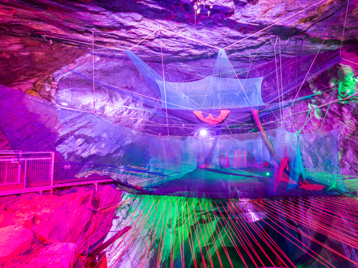 Bounce Below is a set of three giant trampolines nestled inside the Llechwedd Slate Caverns — a former Victorian slate mine in Blaenau Ffestiniog, North Wales. It was created by Zip World, a company specializing in adventure activities.