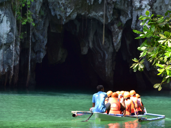 The Puero Princesa Subterranean River National Park in the Philippines has an underground river that stretches more than 26,000 feet within a stunning limestone karst cave system. On underground guided raft trips, you’ll enter chambers that are as large as 390 feet in size.