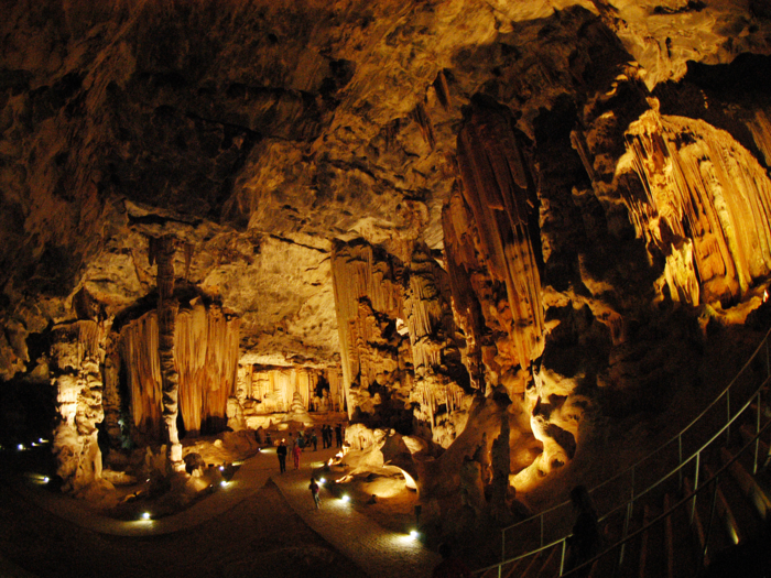 The Cango Caves are found near the town of Oudtshoorn, South Africa, at the head of the picturesque Cango Valley. Dripstone caverns are lined with vast halls and towering formations. Take the adventure tour, where you’ll be led trough hanging crystal gardens adorned with helictites, an active candle-wax column, and incredible cavern chambers.