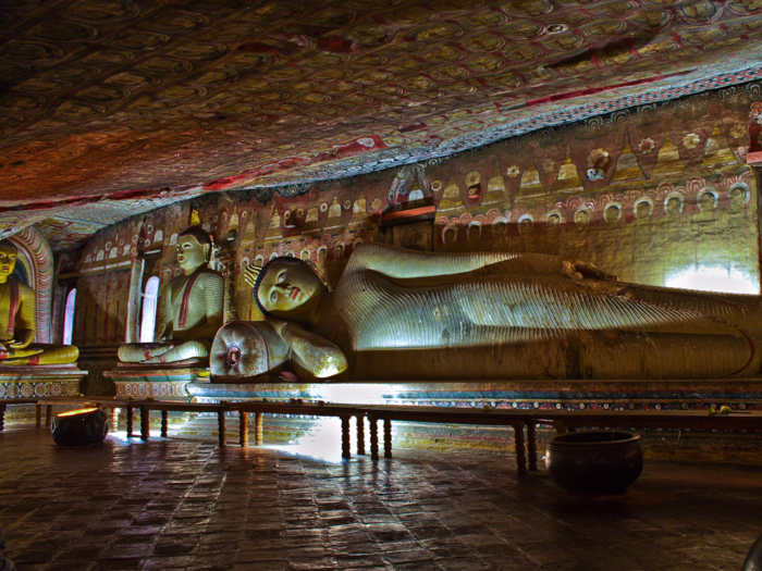 The Dambulla Cave Temple (also known as the Golden Temple of Dambulla) is the largest and best-preserved cave-temple complex in Sri Lanka. Inside, there are Buddhist mural paintings covering entire walls and more than 150 statues dating back centuries.