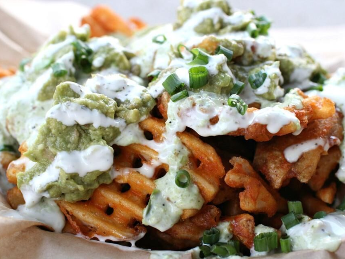 The Lobos Truck, also in Los Angeles, serves a dish they call the "green dragon wachos": waffle fries with green dragon sauce, guacamole, scallions, and ranch.