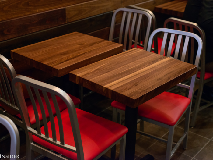 Tables are minimalist, featuring even more natural wood.