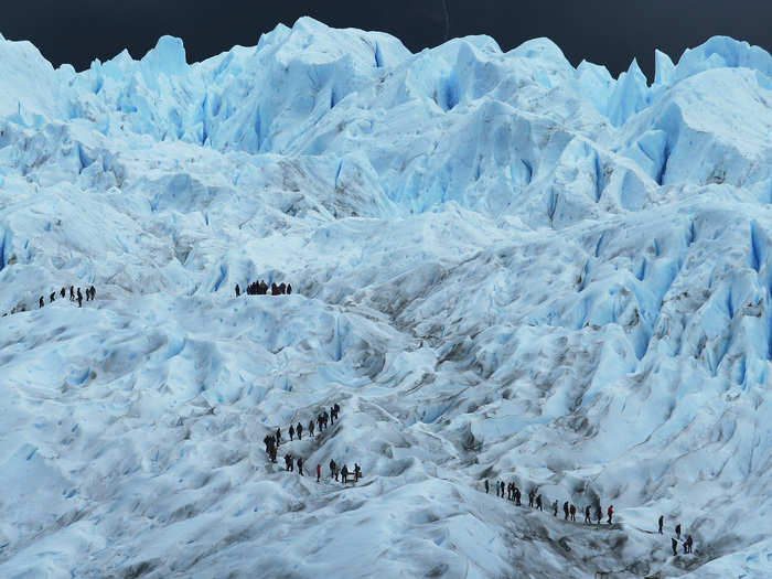 People hike on Perito Moreno glacier, one of Argentina