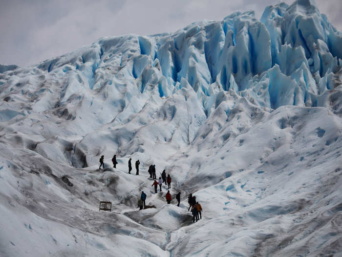 People hike on Perito Moreno glacier