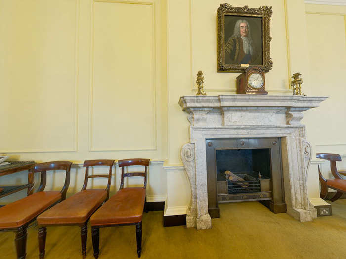 A copy of a portrait of Sir Robert Walpole by Jean-Baptiste van Loo hangs over the fireplace.