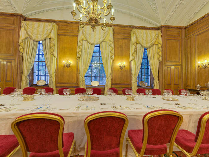 The State Dining room can seat up to 65 people around a large table.