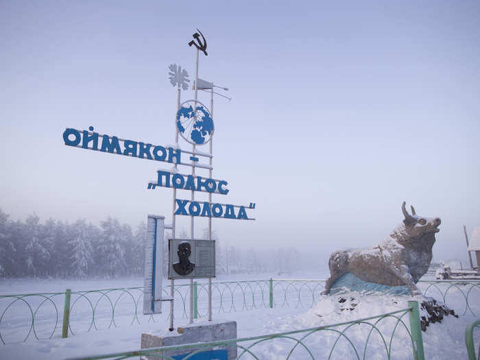 The guys I ended up getting a lift with wavered between hospitable and weirdly threatening. I ate frozen horse blood and macaroni with their family before being dropped off in Oymyakon," Chapple said. The communist-era monument near the entrance of the town marks the record-breaking temperature of -96.16° F, recorded in the village in 1924. The sign reads, "Oymyakon, the Pole of Cold.