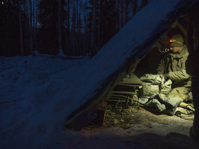 On the first night of school, students are taught to create open primitive shelters that provide little insulation from the elements.