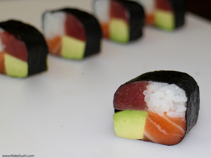 His four seasons sushi roll is a fun twist on a simple salmon, tuna, and avocado roll.