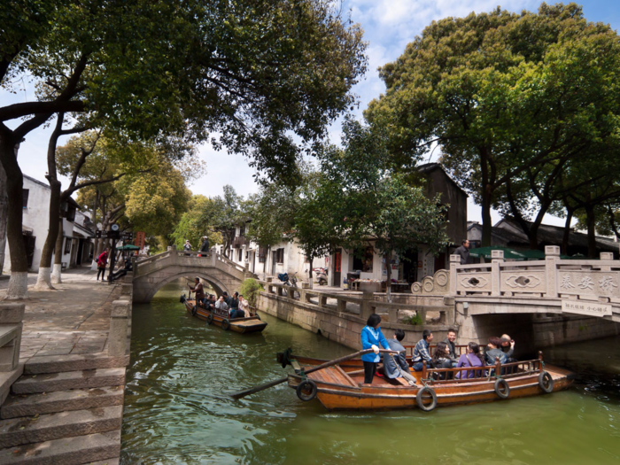 Tongli is a famous ancient water town located near the city of Suzhou in China. The well-preserved town has homes and temples that date back to the Ming and Qing Dynasties. Explore the town through its canals and bridges for a relaxing retreat.