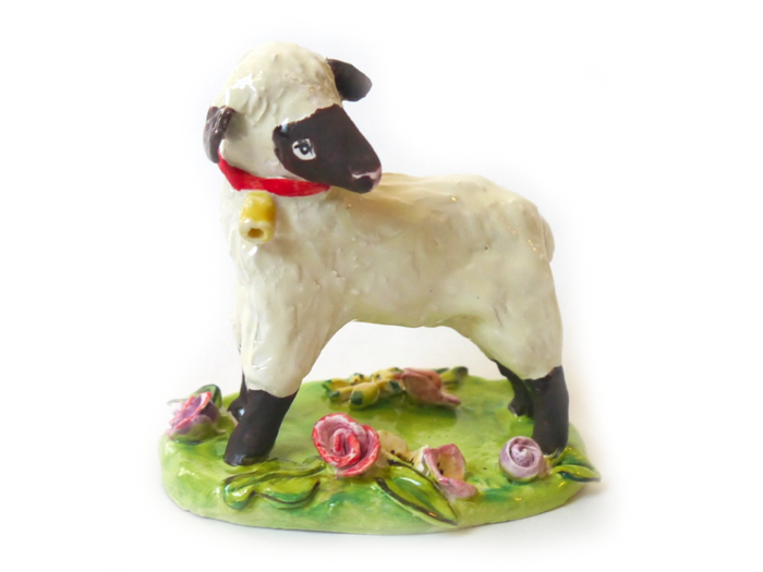 A ceramic sheep you can dress up seasonally