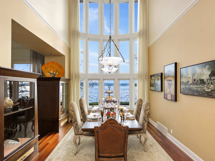 Enter to the formal dining room. Sunlight floods through the room