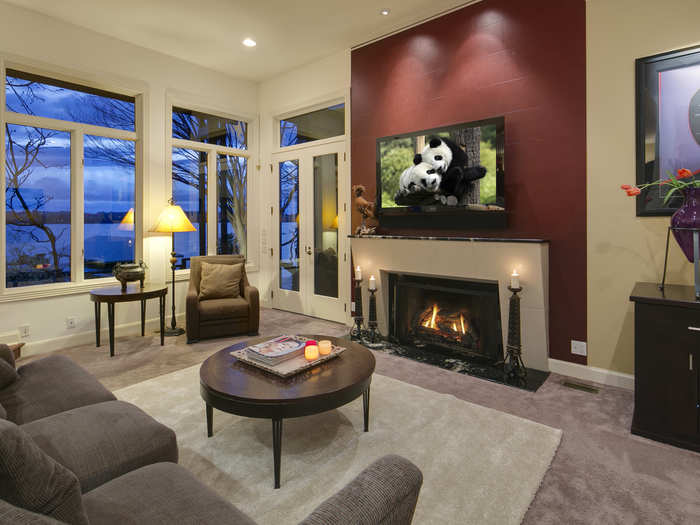 The defining characteristic of the family room is the warm intimacy filling the space. Gallery walls are adorned by Rob