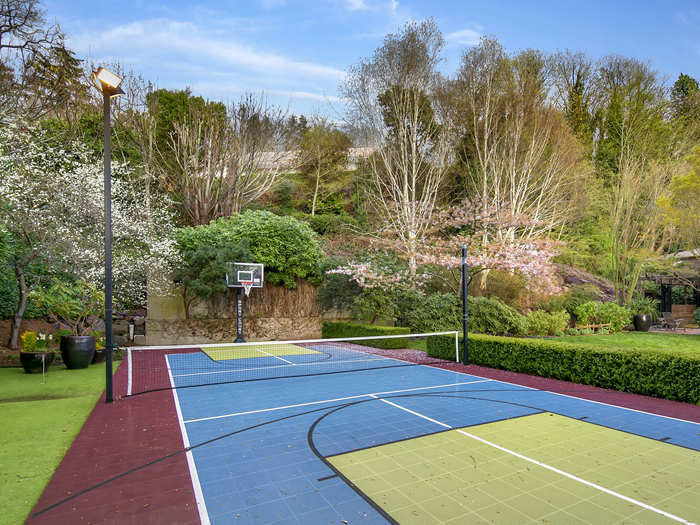 The lit sport court on the property