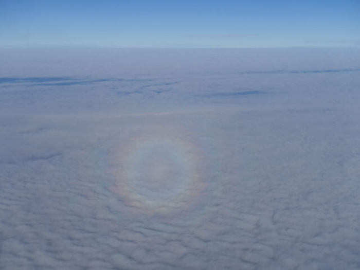 As we flew above the clouds, a very unique rainbow appeared. I was half temped to shout “It’s a double rainbow!” but reminded myself that I was in first class.