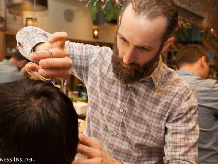 As Geno cut my hair, I noted his precision — clearly a cut above other barbers.