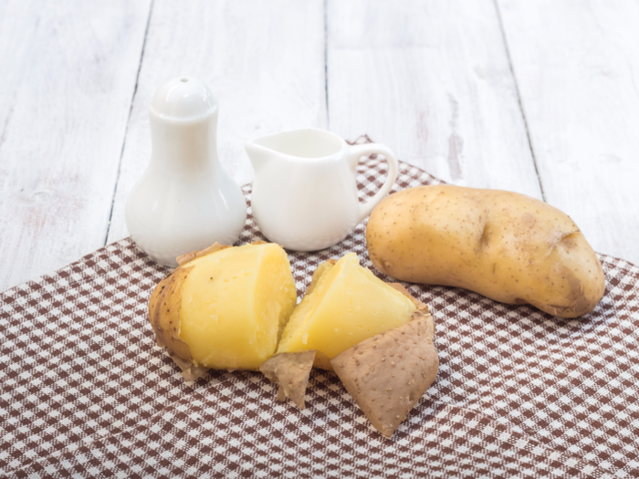 Instead of peeling potatoes, simply boil them and slip the skin right off.