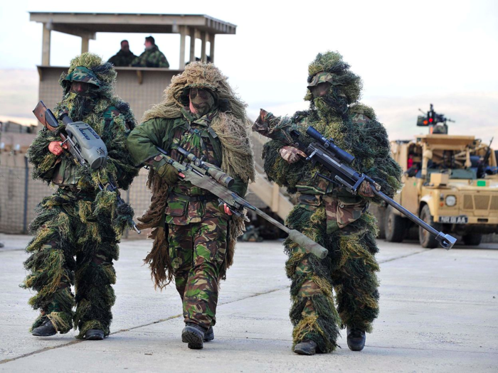 The gun in the middle of the picture below is the British-made Accuracy International sniper rifle. It holds the record distance for a confirmed? kill and is used by British special forces.