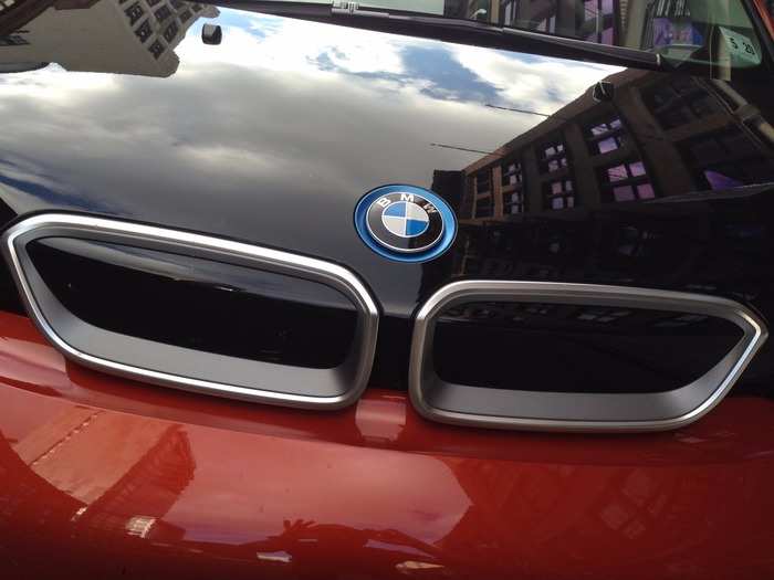 Outside, the i3 updates classic BMW design cues for the 21st century. The split grille has become abstract.