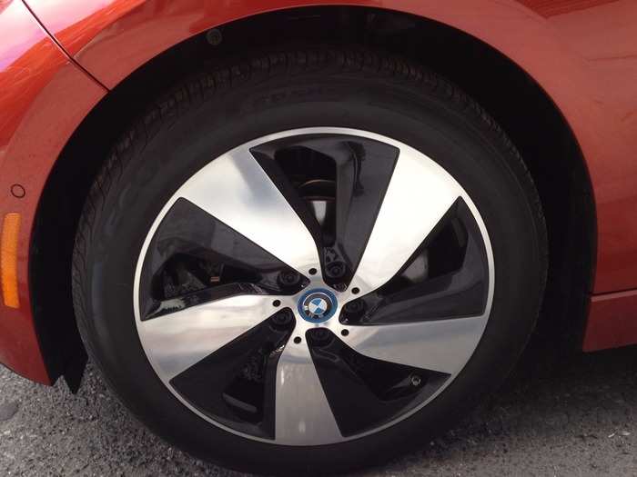 The wheels are large — something that keeps the i3 from looking too compact or economical. They give it a solid stance.