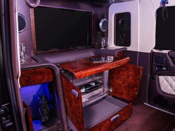 It is also equipped with a satellite TV system, refrigerator, a bar, and a speed-vault quick-access pistol holder.