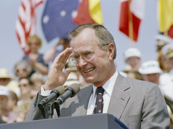 Bush addresses a crowd of veterans during a ceremony at the Korean War Memorial in June 1992, several months before losing re-election.