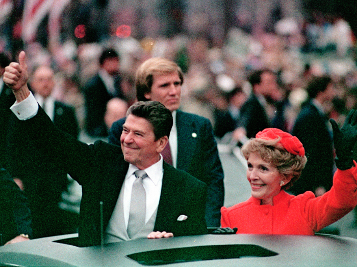 Former President Ronald Reagan and First Lady Nancy Reagan greet fans lined up in Washington at his first inauguration in January 1981.