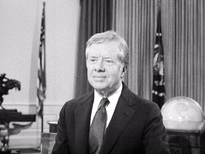 An Associated Press photographer captures Carter preparing for his farewell address to the nation in January 1981.