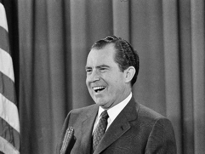 President Richard Nixon gives a press conference in the East Room of the White House several weeks after being sworn in in 1969.