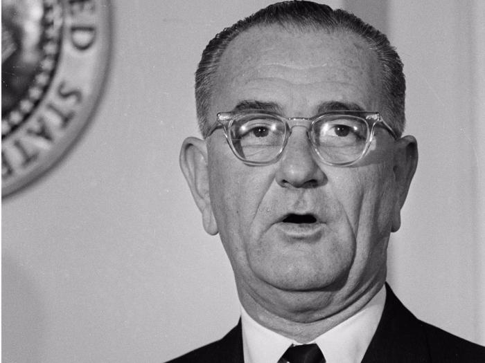 President Lyndon Johnson proclaims a day of mourning for deceased President John F. Kennedy shortly after being sworn in.