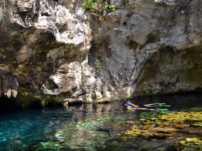 One of the most popular is El Gran Cenote (or Grand Cenote), located a little over two miles from Tulum on the road to the Mayan ruins of Coba. The large cenote has caves where swimmers can snorkel and dive, and a snorkeling area that offers up-close views of large stalactites.