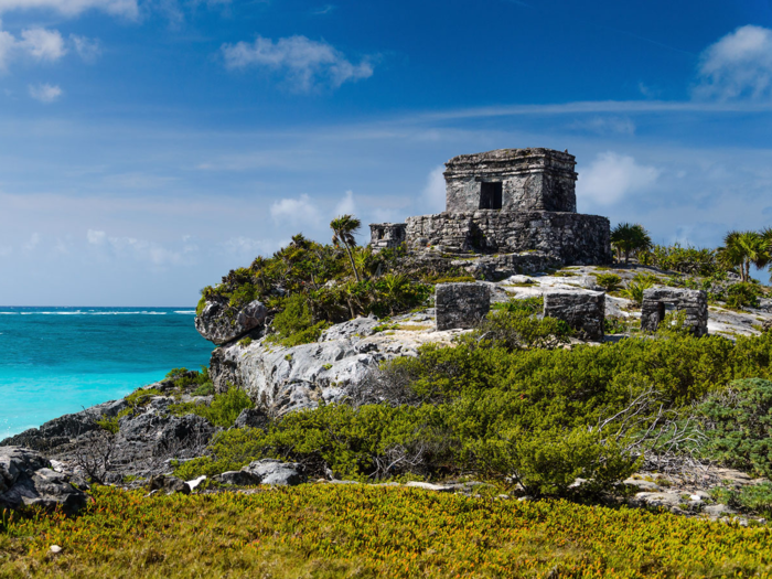 As a site of significant archaeological importance, Tulum is home to a large number of traditional Mayan buildings that have managed to stay intact for years. Today, the famous ruins include a castle that sits perched on the edge of a limestone cliff overlooking the Caribbean sea.