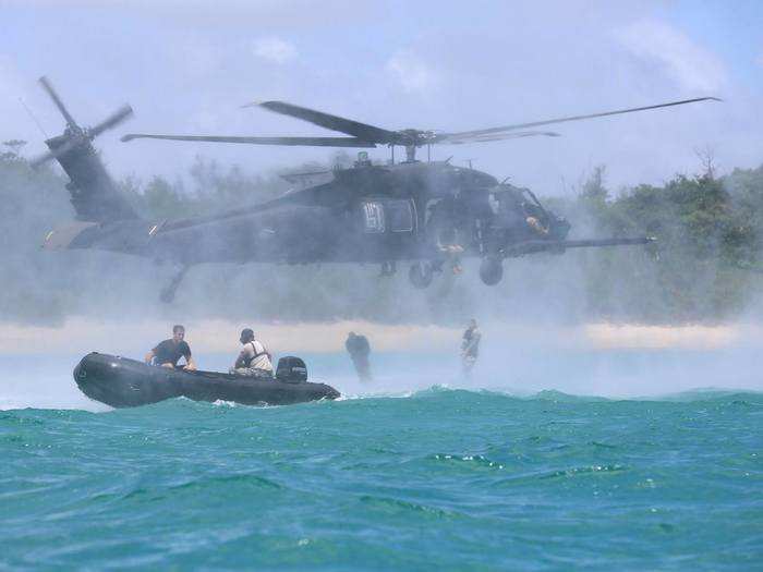 September 29: Soldiers take to the water by jumping out of Black Hawk helicopters in an airborne operation, helicopter cast and recovery, known as helocast, off the shores of Okinawa?.? The operation involves inserting and extracting personnel or equipment from a helicopter over water. Helocasting is an effective means of inserting or extracting reconnaissance elements. Units plan and conduct a helocast operation similar to an air movement operation, except the landing zone is in the water.