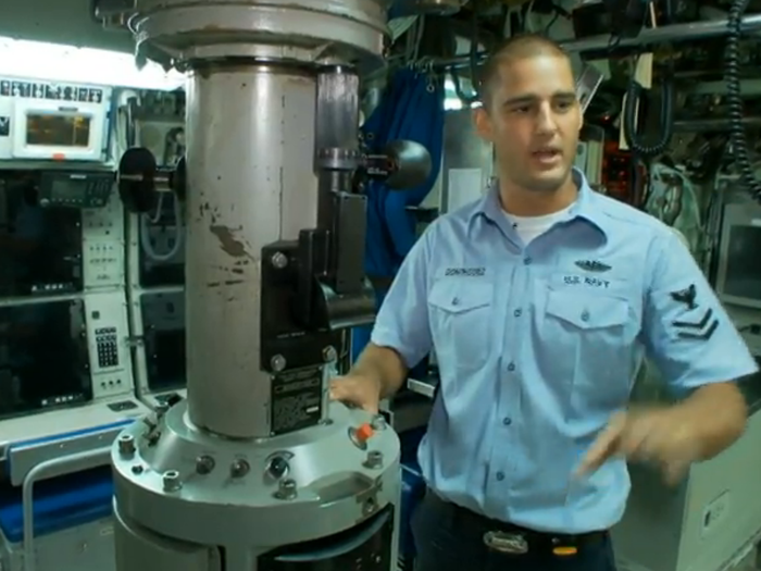 Behind those driving the submarine is the Conn section where the officer of the deck keeps watch. This is also where the submarine