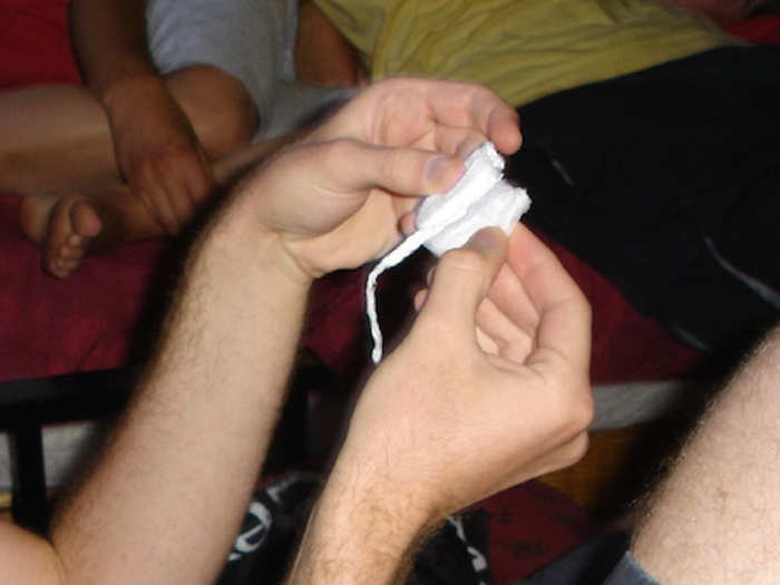 How to use a tampon as a wound dressing