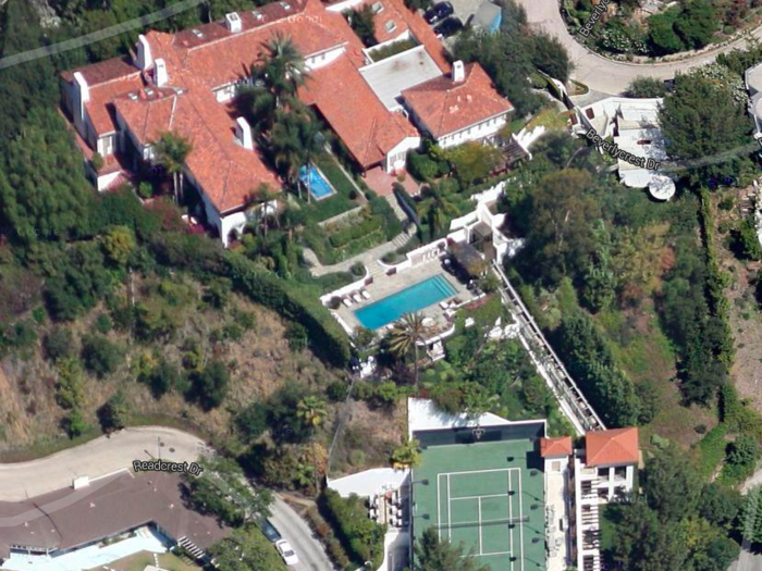 In 1997, Allen bought a 12,952-square-foot Mediterranean-style home in Beverly Hills. Among its ridiculous amenities is a funicular that shuttles guests from the pool deck to a tennis court located on a lower part of the property.