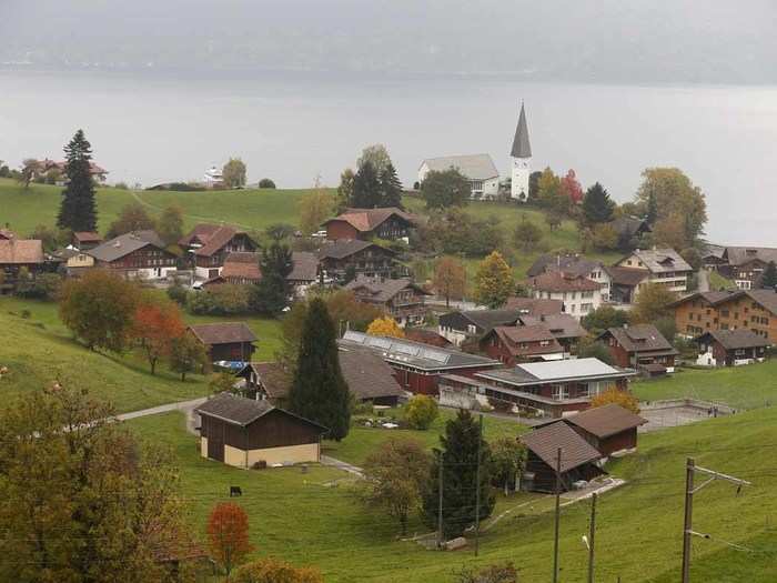 Camouflaged bunkers (in the foreground) take the form of houses in the town of Faulensee.