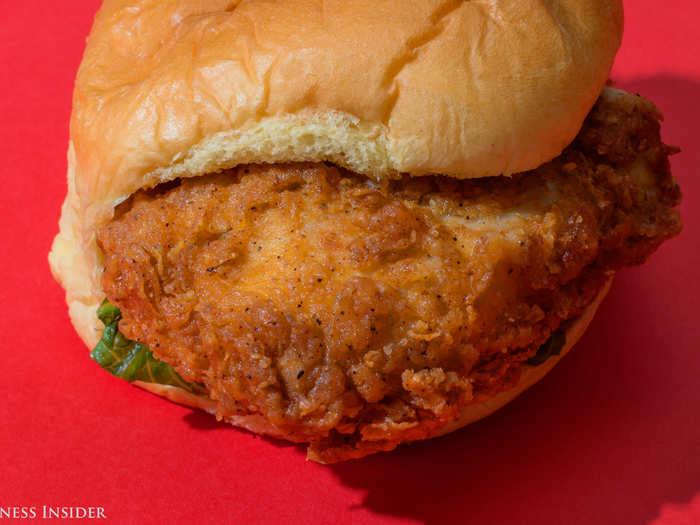 The chicken breast itself appears to be generously seasoned. However, my concern is crisp: Too often, "crispy" chicken sandwiches lead us astray with sweet whispers of crunchy, crispy bites that amount to nothing.