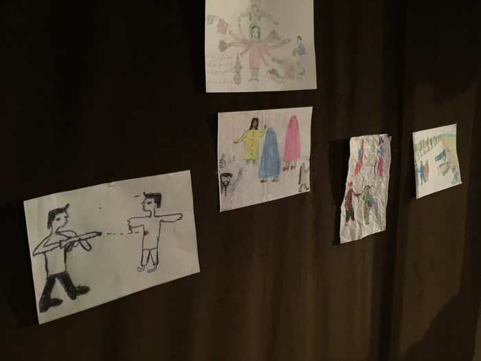 On the walls were drawings that remind you of what life is like for these children.