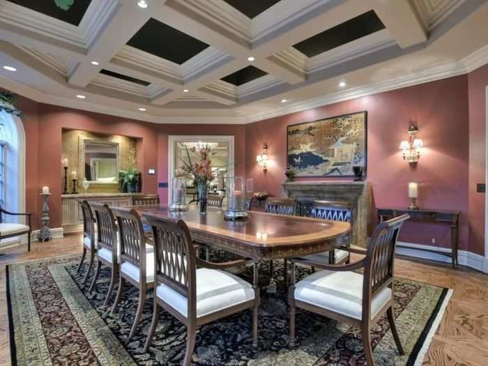 Recessed lighting gives the formal dining room a soft glow.