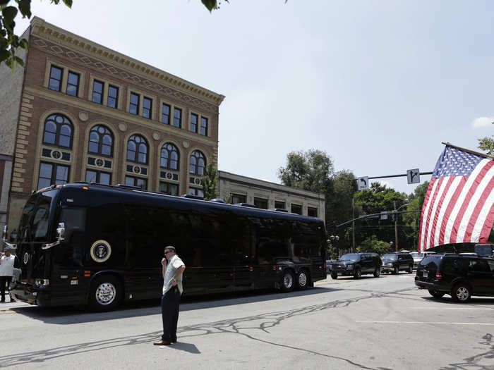 In addition to the security features, the bus comes equipped with a full suite of office equipment including phones, television, radio, and internet.